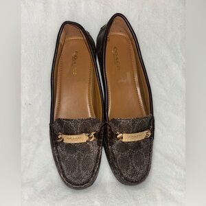Coach Women’s Leather Chestnut Embossed Slip-on Loafers.